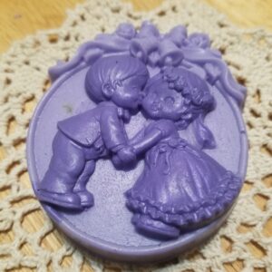 Cute kissing bride and groom soap...