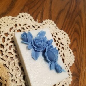 such detail in this rose soap..down to a butterfly in the upper corner!!
